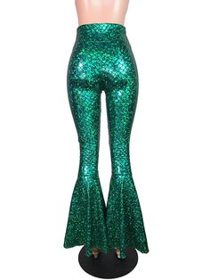 a mannequin with green sequins on it's leggings