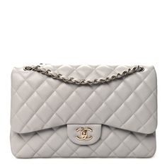 This is an authentic CHANEL Caviar Quilted Jumbo Double Flap in Grey. This stylish shoulder bag is crafted of luxurious caviar textured leather in grey. It features a leather-threadedpolished light gold chain-link shoulder strap, a rearpatch pocket, and a frontflap with a light gold CC turn-lock. The flap opens to reveal an inner flap and a matching grey leather interior with patchpockets. Designer Caviar Leather Bag With Textured Finish, Designer Bags In Textured Caviar Leather, Elegant Double Flap Shoulder Bag With Silver-tone Hardware, Designer Caviar Leather Bags For Formal Occasions, Luxury Caviar Leather Bag For Everyday, Everyday Luxury Caviar Leather Bag, Classic Formal Caviar Leather Bag, Luxury Gray Bag With Palladium Hardware, Elegant Bag In Textured Caviar Leather