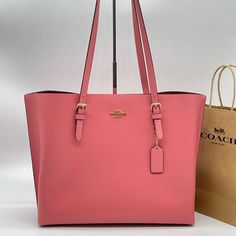 Brand New With Tag Coach Leather Mollie Shoulder Tote Bag Pebble Leather Color: Taffy Inside Multifunction Pocket Zip-Top Closure, Fabric Lining Handles With 10 1/4" Drop Side Open Compartments 13 1/4" (L) X 11" (H) X 5" (W) Luxury Large Capacity Pink Shoulder Bag, Pink Large Capacity Leather Bag, Large Capacity Pink Leather Bag, Coach Blush Bag For Everyday Use, Blush Coach Bag For Everyday Use, Pink Shoulder Bag With Removable Pouch For Shopping, Luxury Pink Bags For Everyday Use, Luxury Pink Bag For Everyday, Luxury Pink Everyday Bags