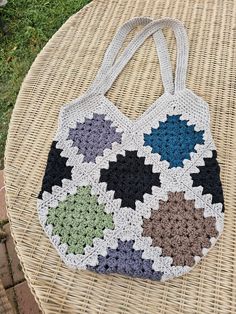 Whether you are heading to the farmer's market, the flea market or the craft market, you will be set for shopping with this multi-colores, thick cotton, handmade market bag. Usable bag space is 12.25" (top to bottom) x 14.5" (left to right), meaning you can fit a lot of great finds in it. Top of handle to v (drop length) is 13.75". All measurements are close but may be off by up to 1/8". From a smoke-free pet friendly home. should be washed in cold water and laid flat to dry. Design is similar on both sides (see pictures). Thank you for looking. Craft Market, Market Bags, Handmade Market, Craft Markets, Farmer's Market, Market Bag, The Craft, Flea Market, Pet Friendly