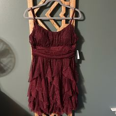 Nwt Wine Colored Sparkle Dress. Super Cute. Size 15. Burgundy Sleeveless Holiday Dress, Sleeveless Burgundy Holiday Dress, Fitted Burgundy Dresses With Ruffles, Fitted Burgundy Ruffled Dresses, Burgundy Ruffled Dress For Night Out, Burgundy Ruffled Dress For Date Night, Burgundy Dress For Date Night And Party Season, Burgundy Dress For Holiday Night Out, Burgundy Dress For Night Out And Holiday