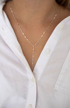 Perfect for layering, stunning oval links shine along this Y-necklace for a delicately beautiful day-to-night accessory. 20" length 14k-gold fill or sterling silver Made in the USA Elegant Lariat Chain Necklace With Lobster Clasp, Elegant Lariat Chain Necklace With Paperclip Chain, Dainty Formal Necklace With Paperclip Chain, Elegant Lariat Paperclip Chain Necklace, Classic 14k Gold Filled Necklaces, Formal Lariat Jewelry With Paperclip Chain, Delicate Sterling Silver Paperclip Chain Necklace, Elegant Gold Lariat Necklace With Lobster Clasp, Elegant Oval Chain Necklace With Lobster Clasp