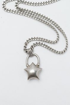 Details Sterling silver 16 inch length 23.54 grams An original 67 design. The Mini Star Necklace, hand designed and created by us. We have spent hours perfecting the shape. An ode to the origami puff star. Our lengths are designed to stack with our heart necklace. Any flaws or minor inconsistencies are characteristics of this handmade item. We have done a wear test to ensure our products last. Materials Sterling Silver 925 Sterling Silver is a lightweight metal made of 92.5% pure silver. It’s highly durable and designed for everyday wear. Necklace Stack, I Love Jewelry, Star Necklace, Pure Silver, Cute Jewelry, Heart Necklace