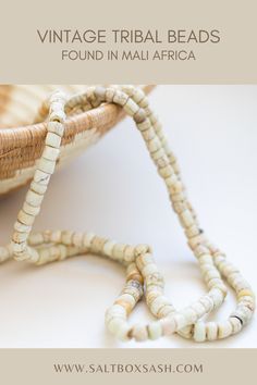 Beautifully aged, very old strand of white beads found in Mali Africa, called 'Green Heart' beads, made sometime between 1400 and 1800s in Murano, Venice. #homedecor #fairtrade #decorbeads #vintage Traditional Heart Beads For Jewelry Making, Spiritual Hand-strung Heishi Beads, Hand-strung Spiritual Heishi Beads, White Heishi Beads Artisan Jewelry, White Artisan Heishi Bead Jewelry, Traditional White Jewelry With Heart Beads, Earthy Beaded White Jewelry, White Heishi Beads Necklaces Hand-strung, Earthy White Beaded Jewelry