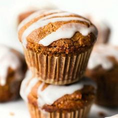 several muffins stacked on top of each other with icing