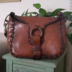 13" length 9" height 4.5" width 19" shoulder drop smoke free Vintage Leather-backed Hobo Satchel Bag, Vintage Leather-backed Hobo Bag For Travel, Vintage Hobo Bag With Leather Backing For Travel, Vintage Leather Hobo Bag For Travel, Vintage Travel Hobo Bag With Leather Backing, Retro Crossbody Bag With Brass Hardware, Retro Soft Leather Crossbody Shoulder Bag, Vintage Leather-lined Hobo Satchel Bag, Vintage Hobo Tote Bag With Leather Lining