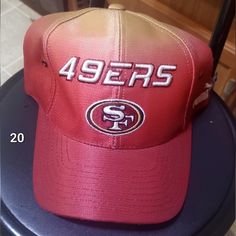 a san francisco sports team hat on top of a stool with the number 94ers embroidered on it