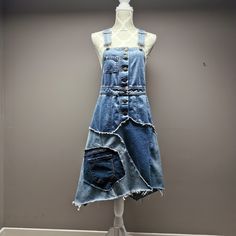 "Upcycled denim patchwork overall dress with frayed seams and jagged hem. Adjustable shoulder straps. Waist measures 30\" and length is approximately 39\"." Upcycled Denim, Recycle Clothes, Denim Patchwork, Overall Dress, Overall Shorts, Shoulder Straps, Overalls, Womens Shorts, Womens Dresses