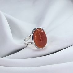 Carnelian Ring, Gemstone Ring, Oval Shape Carnelian Ring, Modern, Simple, Everyday, Gift, Gemstone Jewelry, Natural Stone, Stacking Ring Stone Name: Carnelian Primary Color : Silver Material : 925 Sterling Silver Shape: As Photo Stone Color: Red Explore our exquisite collection of handcrafted gemstone solid silver jewelry on Etsy. Each piece is meticulously designed and expertly crafted, ensuring a unique and timeless beauty. Our jewelry is made with genuine, high-quality gemstones set in solid Classic Carnelian Cabochon Rings, Polished Carnelian Oval Rings, Classic Orange Oval Cabochon Rings, Oval Agate Wedding Rings, Carnelian Oval Cabochon Ring As Gift, Carnelian Oval Cabochon Ring For Gift, Oval Carnelian Ring For Gift, Carnelian Ruby Ring With Oval Cabochon For Gift, Orange Oval Ring With Polished Finish