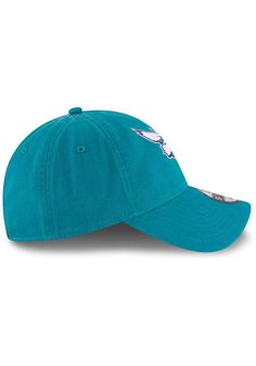 This Charlotte Hornets Teal Adjustable Hat features a front embroidered team logo on a lightly-structured cotton crown, with pre-curved visor and adjustable backstrap. Team logo embroidered on the front, Cloth Strap Closure to dial in the perfect fit, Relaxed, unstructured fit, Pre-curved bill, 100% cotton construction, New Era Flag logo on side, Dad hat, 100% Cotton, Washable, Imported Cotton Curved Visor Hat For Fan Gear, Curved Visor Cotton Hat For Fan Gear, Team-colored Cotton Hat With Embroidered Logo, Curved Brim Cotton Fitted Hat For Fan Gear, Team-colored Cotton Hats With Curved Brim, Cotton Hat With Team Logo For Sports Events, Cotton Sports Hat With Team Logo, Curved Bill Cotton Hat For Fan Merchandise, Cotton Curved Bill Hat For Fan Merchandise