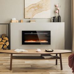 a living room with a fire place on the wall