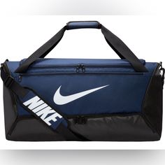 The Durable Nike Brasilia Duffel Features A Spacious Main Compartment For All Your Gear So You Can Feel Prepared. Padded Shoulder Strap Make It Carrying Comfortable, And Multiple Exterior Pockets Provide Quick-Grab Convenience. Fit & Design: Large Main Compartment Zips Shut For Secure Storage Zippered Bottom Compartment Can Hold Your Shoes Or Separate Wet And Dry Clothing Multiple External Pockets Offer Easily Accessible Storage A Coated Bottom Adds Water Resistance And Durability Padded Shoulder Strap Dimensions: 25" L X 12" W X 12" H Spot Clean Brand : Nike Country Of Origin : Imported Style : Dh7710 Dsg Pro Tips Fabric : 100% Polyester Nike Sports Bag, Nike Duffle Bag, Mochila Nike, Sport Nike, Gianfranco Ferre, Training Gear, Duffel Bags, Sports Brands, John Galliano