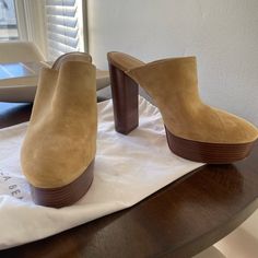 Tan Suede. High Heeled (4+ Inch) . Mules. With Platform. Never Worn. Suede Mules With Sculpted Heel And Round Toe, Suede Mules With Padded Heel And Round Toe, Casual High Heel Shoes With Suede Lining, Casual High Heel Heels With Suede Lining, Casual High Heels With Suede Lining, Brown Closed Toe Heels With Suede Lining, Brown Suede-lined Heels For Spring, Brown Suede Lined Heels For Spring, Brown Mules With 4-inch Heel And Round Toe