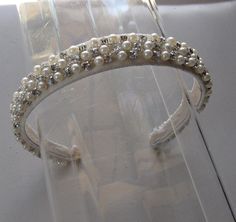 This Pearl Crystal Beaded Ivory Lace Headband is a beautiful accessory for weddings, bridesmaid, parties, and other special occasions. It is elegant, romantic, delicate, stylish, and chic! Will definitely add a sparkling glamorous touch to your outfit!!  I only accept PayPal and ship all orders within 24 hours via USPS.  Feel free to send me a convo with any questions.  Thank you for visiting Hettie Hair Accessories! Lace Headband, White Plains, Lace Headbands, Pearl Crystal, Turbans, Ivory Lace, Hair Accessories Headbands, Crystal Beads, Special Occasion