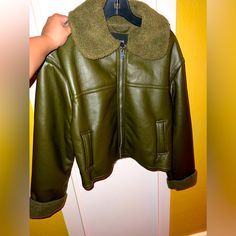 Brand New New Look Faux-Leather Jacket Olive Green Color Jacket Nice And Quality Almost Feels Like Genuine Leather Super Cute And Stylish Zip Up Jacket Has Pockets Perfect For Everyday Wear Size L Same Or Next Day Shipping Trendy Leather Jacket With Faux Fur Lining For Work, Trendy Faux Leather Outerwear With Faux Fur Trim, Trendy Faux Leather Outerwear With Faux Fur Lining, Trendy Faux Leather Jacket With Faux Fur Trim, Trendy Green Leather Winter Jacket, Trendy Green Leather Jacket For Winter, Camouflage Military Jacket, Grey Peacoat, Black Peacoat