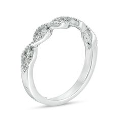 Working with your wardrobe, this vintage-inspired diamond stackable band creates a romantic touch of sparkle. Crafted in cool 10K white gold, this shimmering design features duos of diamonds in marquise-shaped twist frames. Intricate milgrain detailing lends heirloom appeal. Radiant with 1/6 ct. t.w. of diamonds and a brilliant buffed luster, this keepsake band is a versatile addition to your stack. Adjustable Diamond White Stackable Rings With Diamond Accents, White Gold Stackable Heart-cut Jewelry, Elegant White Hallmarked Stackable Rings, Modern Twist White Gold Stackable 14k Rings, Classic Stackable Rings In 14k Gold, Diamond White, Stackable Bands, Peoples Jewellers, Diamond Stone, White Metal