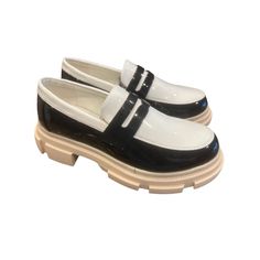 Elevate Your Style With These Nib Yetier Platform Loafer Slip-Ons. These Chunky Loafers Are Perfect For Women Who Love Comfort And Style. The Faux Leather Upper Material Is Made With High-Quality Materials That Ensure Durability And Comfort. These Black And White Loafers Come In Size 9 And Are Perfect For Any Casual Occasion. The Penny Model Is Designed To Provide A Comfortable Fit For Women, With A Platform Sole That Adds Extra Height And Style. These Shoes Are Perfect For Women Who Want To Look Fashionable While Staying Comfortable. Chanel Platform Loafers, Black And White Loafers, Chunky Loafer, White Loafers, Chunky Loafers, Platform Loafers, Slip Ons, Loafer Flats, Loafer Shoes