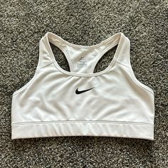 Nike Sports Bra Size: M Color: White Never Worn White Moisture-wicking Sports Bra, White Racerback Sports Bra, Athleisure Style, White Racerback Sports Bra Athleisure, White Athleisure Sports Bra For Light Sports, White Sweat-wicking Sports Bra, White Sweat Resistant Sports Bra, White Sports Bra With Light Support, White Athletic Fit Sports Bra With Go-dry, White Racerback Activewear For Sports