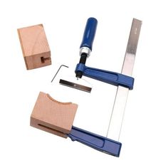 a pair of woodworking tools and a knife