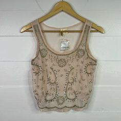 New With Tags! Passport Sleeveless Tank Top Shirt -Size S -Blush Pink -Silver Bead Work With Sequins -Scoop Neck -Sleeveless Tank Top -Cropped -Semi See-Through -100% Polyester -Note: Beaded Embroidery Naturally Can Have Loose Beads Or Easily Fall Off (Handle With Care) -No Stains, Flaws Or Holes Measurements Laying Flat: Bust 16.5” Length 16.5” Aa22 Elegant Beaded Tank Top For Spring, Beaded Fitted Tank Top For Night Out, Beaded Sleeveless Tank Top For Party, Spring Beaded Tank Top For Party, Glamorous Beaded Sleeveless Tops, Glamorous Embellished Summer Tank Top, Fitted Beaded Tank Top For Night Out, Glamorous Embellished Sleeveless Crop Top, Embellished Silver Summer Top