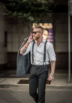 Tattoos, suspenders & suittrousers, fade, and bread... fantastic style Groom Attire With Suspenders, Hipster Wedding Outfit Men, Men Outfit With Suspenders, Dress Pants With Suspenders Men, Casual Groom Attire Suspenders, Men’s Suspenders, Mens Suspenders Outfit, Suspender Outfits For Men, T Shirt And Suspenders Men