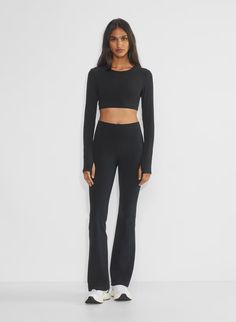 BUTTER NEW CHEEKY HI-RISE FLARE LEGGING | Aritzia Aritzia Flare Pants, Flared Workout Pants, Aritzia Flare Leggings, Aritzia Workout Set, 437 Activewear, Aritzia Leggings, Aritzia Outfit, Flare Leggings Outfit, Black Flared Leggings