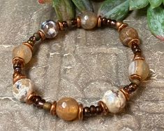 "Very cool and unique copper stretch bracelet with brown agate and copper beads. Fits an average woman's wrist of 6 - 6.5\" but can be made smaller or larger if needed." Brown Jewelry Aesthetic, Brown Beaded Bracelets, Bracelet Inspo, Brown Agate, Brown Bracelet, Women's Bracelets, Creative Stuff, Boho Bracelet, Beaded Stretch Bracelet