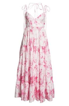 Out-of-focus flowers seem to be waving in the wind on this tiered dress with tie straps that hews true to Erdem Moralioglu's passion for timeless style. Ties at neck V-neck Adjustable tie straps Lined 100% cotton Dry clean Imported Designer Clothing Pink Tiered Dress With Adjustable Straps, Spring Tiered Dress With Tie Straps, Tiered Dress With Adjustable Straps For Garden Party, Tiered Garden Party Dress With Adjustable Straps, Feminine Pink Tiered Dress With Floral Print, Feminine Tiered Dress With Tie Straps, Daywear Tiered Dress With Adjustable Straps, Tiered Daywear Dress With Tie Straps, Tiered Dress With Adjustable Straps For Daywear