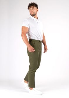 Crafted from a luxurious custom cotton blend, the Olive Cotton Pants offer a refined yet versatile look. These elegant trousers boast a timeless olive hue that will never go out of style. Effortlessly elevate any outfit with these sophisticated premium pants. Elegant Green Bottoms With Welt Pockets, Chic Olive Trousers, Chic Olive Pants For Work, Chic Olive Pants For Workwear, Elegant Olive Bottoms For Workwear, Green High-waisted Dress Pants For Business Casual, Olive Trousers For Workwear, Classic Green Bottoms With Straight Hem, Green Tapered Leg Dress Pants For Business Casual