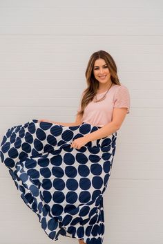 We cannot get over how stylish this skirt is! The fun polka dot print and accordion accents makes this such a cute, elegant look! Wear this skirt to any event and you are sure to receive compliments! We love tucking a blouse into this for a more elevated look or a basic or graphic tee for a casual feel! Spring Skirt With Polka Dot Pattern And Elastic Waistband, Spring Polka Dot Long Skirt, Polka Dot Long Skirt For Spring, Polka Dot Lined Midi Skirt, Casual Long Polka Dot Skirt, Polka Dot Pleated Party Skirt, Polka Dot Pleated Skirt For Party, Pleated Polka Dot Skirt For Party, Polka Dot Relaxed Midi Skirt