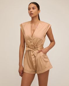 Beige V-neck Jumpsuit For Day Out, Summer Beige V-neck Jumpsuits And Rompers, Summer Cotton V-neck Jumpsuits And Rompers, Summer Cotton V-neck Jumpsuit, Chic Daywear Jumpsuits And Rompers, Beige V-neck Jumpsuits And Rompers For Day Out, Chic Beige Jumpsuits And Rompers For Spring, Chic Beige Jumpsuits And Rompers For Day Out, Cotton V-neck Jumpsuit For Work