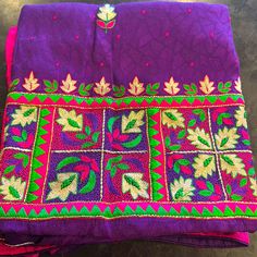 Beautiful Pattern And Rich Colors. Dupatta Is Pink And With Amazing Embroidery. It Is An Unstitched Suit With Fabric For Full Suit And Dupatta. Fitted Purple Embroidered Sets, Festive Purple Embroidered Set, Festive Embroidered Purple Set, Traditional Purple Resham Embroidery Set, Festive Purple Sets With Motifs, Festive Purple Sets With Floral Embroidery, Festive Purple Floral Embroidered Sets, Festive Purple Floral Embroidery Sets, Bollywood Purple Embroidered Fabric With Dori Work