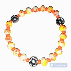 Orange, Yellow, & White Beaded Floral Stretch Bracelet Made With White Glass Orange & Yellow Paint Splashed Beads, Orange Seed Beads, & Tibetan Silver Tone Metal Flower Beads. 8" Stretch Bracelet Handmade By Seller. All Handmade Items Are Unique And One Of A Kind And Therefore May Have Slight Differences, Imperfections, Or Irregularities. Colors May Vary Due To Different Screen/Camera Settings. Message Me If You Have Any Questions. Pet Friendly, Smoke Free Home. Reasonable Offers Are Welcome! Tags: Boho, Summer, Spring, Stackable, Multicolor, Mother's Day, Plus Size Casual Beaded Bracelets With Round Beads For Spring, Summer Adjustable Jewelry With Faceted Beads, Adjustable Faceted Beads Jewelry For Summer, Adjustable Jewelry With Faceted Beads For Summer, Adjustable Orange Bracelets With 8mm Beads, White Stretch Bracelet For Beach Spring Season, White Stretch Bracelet For Beach In Spring, Adjustable Large Beads Bracelets For Summer, Adjustable Orange Beaded Bracelets With 8mm Beads