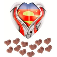 chocolate hearts in the shape of a superman symbol with other heart shaped pieces surrounding them