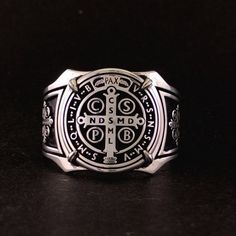 Your custom solid sterling Silver ring will be made on your order, customize this Coat of Arms and your logo on this collection! A beautiful symbol that will fit your hands and style. perfect gift for anniversary, special dates and any date you can imagine can be Personalized. Different colors are silver, gold, rose gold. White gold and 24K gold options will never tarnish and last decades. Please contact me if you are interested in my jewelry. >ABOUT ME: I have 35 years of experience in making c Family Crest Rings, St Benedict Medal, Benedict Medal, Beautiful Symbols, St Benedict, Saint Benedict, Cross Ring, Religious Jewelry, Men's Rings