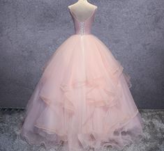 Step into a world of fairytale elegance with this Pink Ball-Gown Organza Floor-Length Prom Dress. This ball gown is made from luxurious organza, the soft pink hue adds a touch of romantic charm, while the intricate appliqued lace and delicate beading embellishments bring a sophisticated sparkle. A lace-up back ensures a perfect fit, making this gown an ideal choice for any prom or formal occasion. Details: Silhouette: Ball-Gown Style Fabric: Organza Fabric Color: Pink Color Length: Floor-Length Pink Ball Gown, White Homecoming Dresses, Blue Homecoming Dresses, Gown Style, Floor Length Prom Dresses, Dresses Quinceanera, Evening Dresses Cocktail, Organza Fabric, Quinceanera Dresses