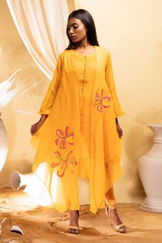 Mango yellow cotton silk chanderi applique overlay with floral motifs. Comes with a kurta, leggings pant and a separate inner slip.` - Aza Fashions Yellow Mulmul Palazzo Set With Dabka Work, Yellow Palazzo Set With Dabka Work In Mulmul, Designer Yellow Mulmul Dupatta, Yellow Mulmul Sets With Dabka Work, Cotton Long Sleeve Palazzo Set With Gota Work, Cotton Palazzo Set With Gota Work And Long Sleeves, Yellow Mulmul Kurta With Dabka Work, Long Sleeve Cotton Palazzo Set With Gota Work, Yellow Mulmul Sets With Traditional Drape