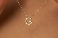 Show off your sophisticated and brilliant style in GOLDx's Diamond Initial Necklace, featuring a dainty initial charm set with sparkling diamonds on a delicate chain of 14K gold. Customize this pendant necklace with either your first or last initial or the initial of your significant other. This dazzling piece is a definite crowd-pleaser particularly when you rock it with a few fine necklaces and a pair of heels for a flirty look. Letter G Necklace Material: Solid Gold, real gold (not gold fille Gold Minimalist Initial Necklace With Diamond Accents, Everyday Gold Diamond Initial Necklace, Everyday Gold Initial Pendant Diamond Necklace, Classic Diamond Necklace With Initials For Formal Occasions, Classic Diamond Necklace With Initials For Formal Events, Classic Formal Diamond Necklace With Initials, Minimalist Initial Necklace With Diamond Accents For Gift, Minimalist Initial Necklace With Diamond Accents As Gift, Yellow Gold Initial Necklace With Diamond Accents As Gift