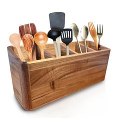 wooden utensil holder with spoons and spatulas in it on a white background