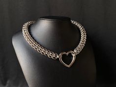 A beautiful choker made from 100% stainless steel rings, a brilliant metal for jewelry making due to it being hypoallergenic, anti rust and good on sensitive skin all while being very durable. With a lobster clasp closure. Length includes closure. Size 37-42cm You can choose the choker measurements and I can also create the exact size you need if you are not satisfied with the standard sizes. Please feel free to message me if you have any questions. Silver Heart Chain Choker, Silver Heart-shaped Chain Choker, Gothic Chainmail Jewelry Gift, Stainless Steel Chain Link Jewelry With Jump Ring, Gothic Stainless Steel Chainmail Jewelry, Handmade Stainless Steel Choker, Metal Chainmail Choker As A Gift, Silver Chainmail Choker As A Gift, Chainmail Choker