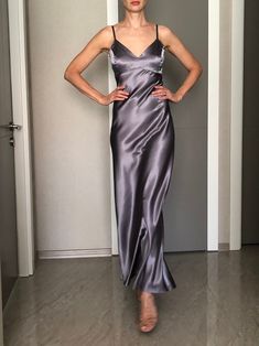 This silk satin slip dress can be worn as a bridesmaid dress, party and date dress and for many other occasions. Made of satin silk. DESCRİPTİON:  -Adjustable straps.  -Designed for a slim but relaxed fit.  -Unlined. İt is a custom made dress, tailored according to your preferences, you can choose the length of the dress and order it with cut on the front.  While ordering write your bust, waist and hips measure, so the dress will be made to your size. Please enquire if you're interested in different color. SIZING INFO: XS/34/US4: bust: 82-86cm (32-33 inch) waist 64-66 cm (24-25 inch)  S/36/ US6: bust: 86-88cm (33-34 inch) waist: 66-68 cm (25-26 inch) M/38/ US8: bust: 88-92 cm (34-36 inch) waist: 68-72 cm (26-28 inch) L/40/ US10:  bust: 92-94 cm (36-37 inch) waist: 72-74 cm (28-29 inch) WAS Dark Grey Silk Dress, Satin V Neck Dress, Dark Grey Satin Dress, Floor-length Satin Slip Dress For Summer, Summer Satin Floor-length Slip Dress, Elegant Satin Dress With Adjustable Straps For Summer, Elegant Summer Satin Dress With Adjustable Straps, Sleeveless Satin Suspender Dress For Prom, Evening Satin Suspender Dress With Spaghetti Straps