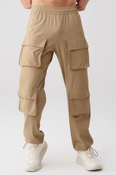 Cargo Venture Pant - Gravel | Alo Yoga Functional Pants With Side Pockets, Alo Yoga Relaxed Fit Pants With Pockets, Functional Solid Bottoms With Cargo Pockets, Casual Full-length Alo Yoga Pants, Alo Yoga Relaxed Fit Sports Bottoms, Alo Yoga Solid Color Pants With Pockets, Alo Yoga Solid Pants With Pockets, Functional Full-length Bottoms With Cargo Pockets, Functional Full-length Pants With Pockets