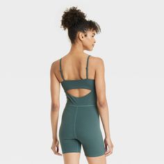 Why we're ALL IN: Everyday soft short bodysuit with a sleeveless design and above-knee length. Crafted from midweight interlock fabric with nylon and spandex for flexible comfort during any activity. Boasts moisture-wicking and quick-drying properties to help keep you nice and cool, as well as a UPF 50+ rating to shield you from the sun's rays. Adjustable straps, keyhole back and pull-on style complete the look. All in Motion™: Made for every move, priced for every day. Sporty Sleeveless Bodysuit With Built-in Bra, Sleeveless Gym Bodysuit For Summer, Summer Gym Sleeveless Bodysuit, Summer Sleeveless Gym Bodysuit, Sleeveless Summer Gym Bodysuit, Fitted Summer Bodysuit For Gym, Fitted Bodysuit For Gym And Summer, Summer Gym Fitted Bodysuit, Sports Sleeveless Jumpsuits And Rompers With Built-in Bra