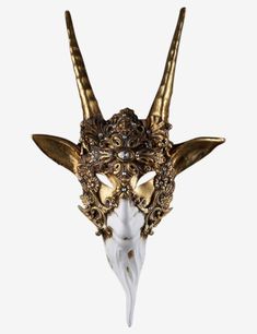 Capricornus authentic venetian mask in paper mache with a unique baroque style. This item is strictly handcrafted in Venice, Italy by the famous artists of the city according to the carnival tradition. Each item comes with certificate of authenticity. Mask Dimensions: Height: 56 cmWidth: 39 cmDepth: 10 cm Venetian Masks Art, Goat Mask, Ball Masks, Venetian Masquerade Masks, Venice Mask, Venetian Carnival Masks, Diamond Skull, Mask Aesthetic, Ball Mask