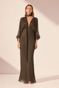 Plunged balloon sleeve maxi dress in olive in a light weight semi-sheer chiffon. Long Sleeve Fall Maxi Dress, Wedding Guest Dress Long Sleeve, Long Sleeve Wedding Guest Dress, Olive Dresses, Shona Joy Dress, Brown Maxi Dress, Fall Maxi, Dresses For Wedding Guests, Olive Dress