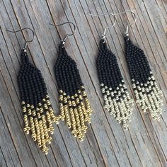 Native American earrings. Arrow pattern including seed beads in matte and metallic with warm colors. - Black and Gold - Black and Silver If you want a custom order :  contact me . Each of my creations is inspired by nature . Thank you and happy ! Black Beaded Earrings With Round Beads And Fringe, Black Beaded Tassel Earrings With Round Beads, Black Beaded Fringe Earrings With Round Beads, Gold Beaded Fringe Earrings With Adjustable Fit, Gold Beaded Earrings With Fringe, Black Bohemian Beaded Earrings With Gold Beads, Native American Medicine Wheel, Native American Earrings, Native American Beaded Earrings