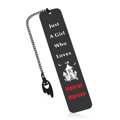 a black bookmark with the words just a girl who loves horror movies on it