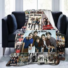 the one direction blanket is sitting on a couch