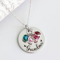 Whether you're looking for a gift for Mother's Day, a birthday, or just because, this necklace is the perfect way to show your grandma how much you care. You can also add birthstones as the family grows! At HeartfeltTokens, our customized jewelry is expertly engraved and made with high-quality stainless steel to ensure a timeless design that won't fade over time. All of our items are 100% designed, engraved, and shipped to you from our home studio in Florida, so I thank you for supporting our sm Mother's Day Sterling Silver Birthstone Necklace, Round Pendant Necklace With Hallmark For Mother's Day, Sterling Silver Birthstone Necklace Round Pendant For Mom, Nickel-free Necklace For Mother's Day Personalized Gift, Sterling Silver Birthstone Necklace For Birthday Gift, Mother's Day Birthday Birthstone Charm Necklace, Mother's Day Birthstone Charm Necklaces For Birthday, Valentine's Day Birthstone Jewelry For Mom, Valentine's Day Birthstone Jewelry Gift For Mom