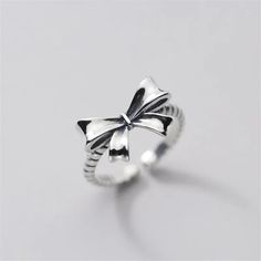 Daiiibabyyy Silver Color Bow Knot Ring for Women Girl Lovely Korea Fashion Gift Jewelry Wholesale Brand Name: Daiiibabyyy Metals Type: Copper Material: Metal Gender: Women Item Type: Rings Style: Classic Shape\pattern: Bowknot Fine or Fashion: fashion Occasion: party Cute Adjustable Rings For Parties, Cute Adjustable Party Rings, Adjustable Cute Party Rings, Cute Silver Ring Jewelry, Cute Silver Rings For Gift, Trendy Silver Rings For Summer, Trendy Silver Rings, Hot Necklaces, Copper Style